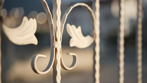 rust wrought iron fence